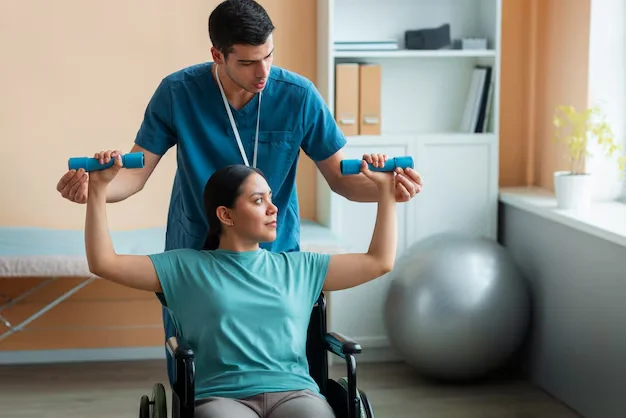 Physical therapist assisting a patient with weight lifting.